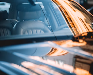close-up photography of black vehicle during daytime